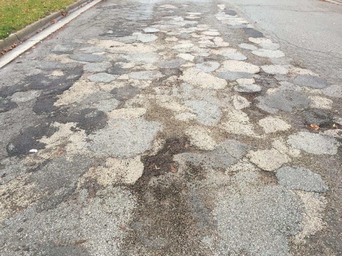 Georgia street is host to a foray of potholes and cracks