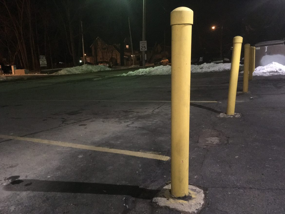 Parking spaces lie vacant during the Super Bowl at Lakeside Party Store.
