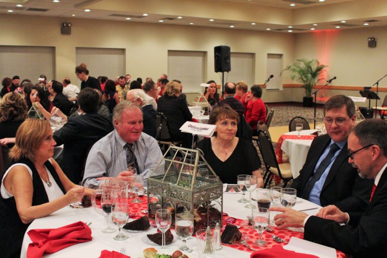 Attendees of last year's Red Tie Affair gathering at the Banquet and Conference Center of Dewitt. Courtesy of Loretta Spinrad. 