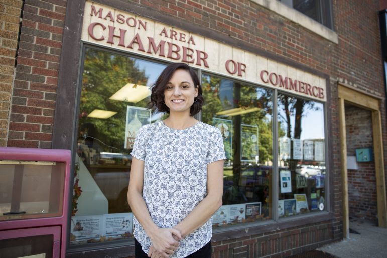 Sarah Russell stands outside of the Mason Chamber of Commerces