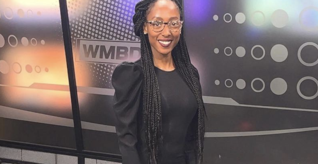 Treasure Roberts in braids with WMBD backdrop