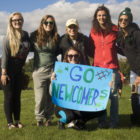 Members of the student group Refugee Outreach Kalamazoo at Michigan State University show up to cheer on the Newcomers youth soccer team.