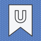White pennant banner with a capital letter "U" against a blue, polka dot background.
