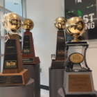 The Spartan women's basketball team displays championship trophies in the team's main office. Some of the credit for those trophies may go to the team's scout team.