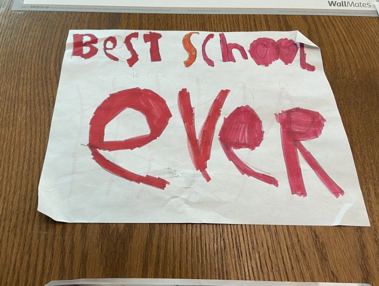 A student illustration that says "Best School Ever"