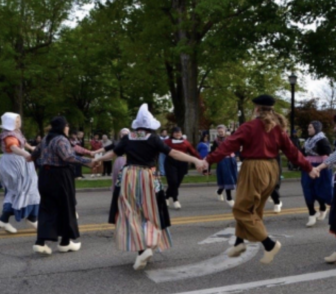 Students doing traditional dance at Holland’s Tulip Time Festival.