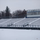 East Lansing High School football field on a snowy day.