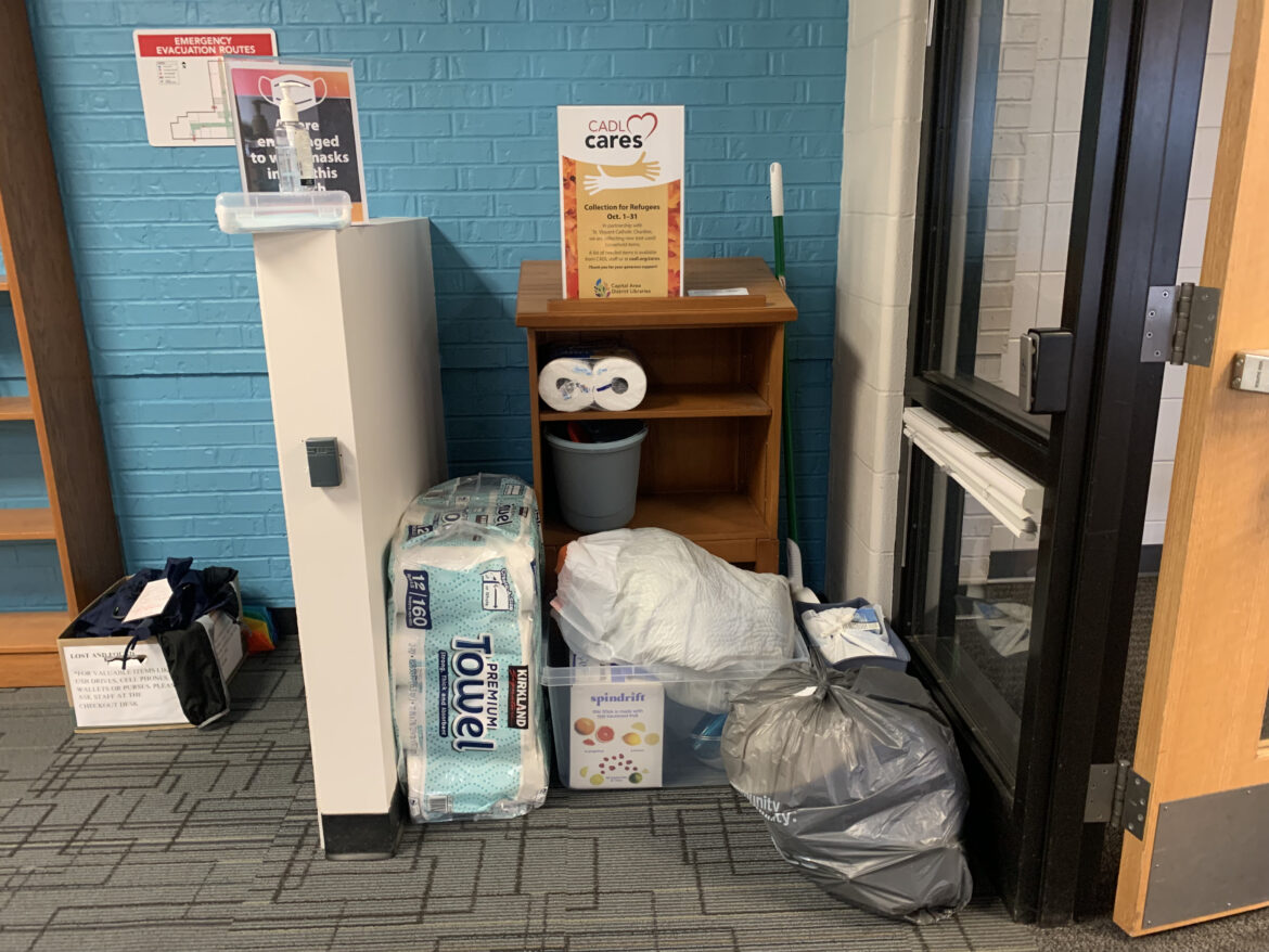 Donated goods sit in the collection area at the Haslett branch of the Capital Area District Libraries.