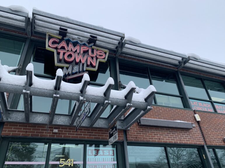 Campus Town Mall sign covered in snow