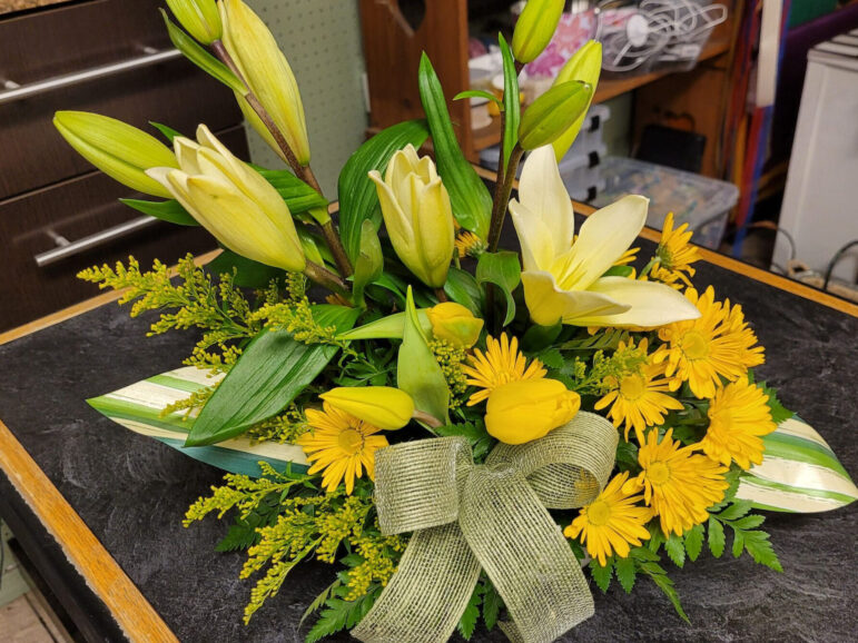 Large bouquet of yellow and green flowers