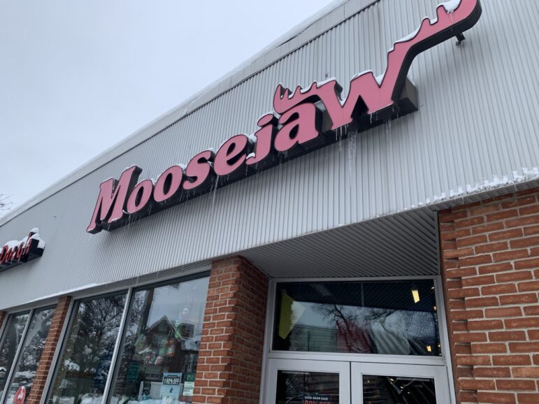 Snow and ice cover the Moosejaw Sign