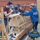 Students at the Great Lakes Boat Building School build a wooden boat, an iconic mode of transportation around Les Cheneaux Islands