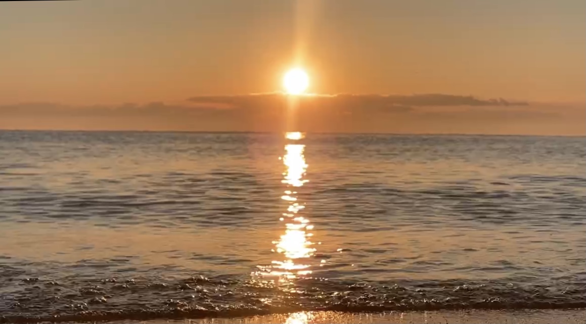 Photo of sunrise on Lake Michigan.