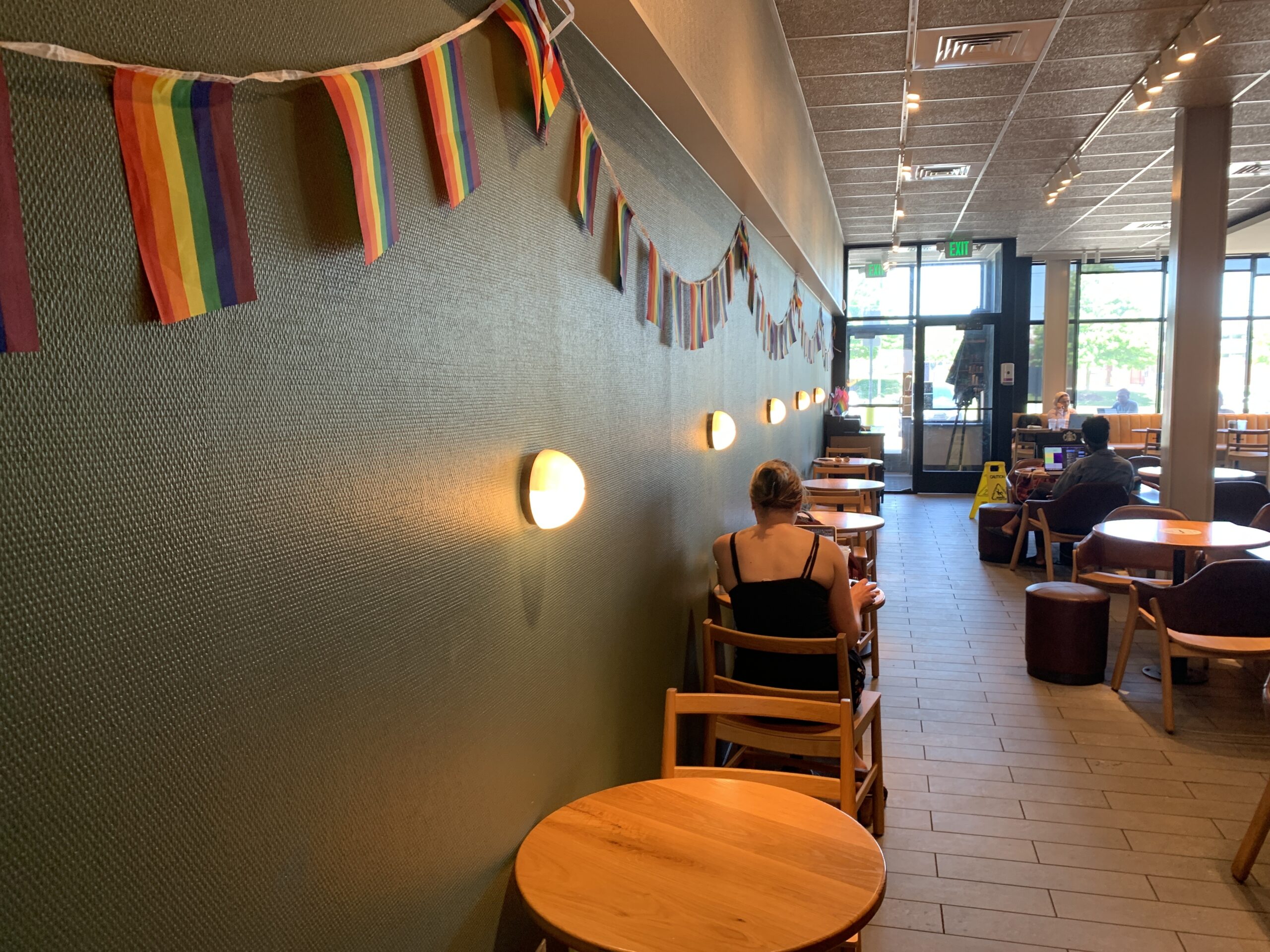 Starbucks on Lake Lansing Road shows pride with flags around the cafe