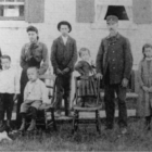 Lighthouse keeper James Davenport and his eight children at McGulpin Point Lighthouse after his wife’s death.