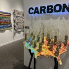 One exhibit at 1.5° Celsius emphasizes how plants can help to store carbon dioxide in soil. Lowering carbon emissions is often a focus of climate change solutions.