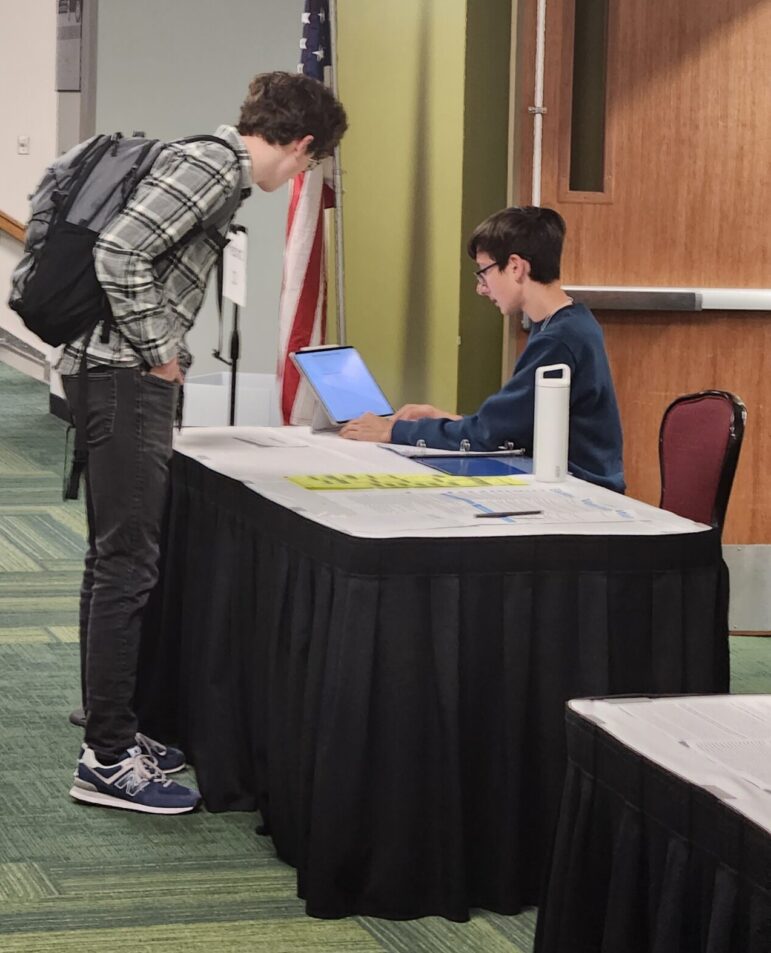 Student signs into vote at the MSU Union