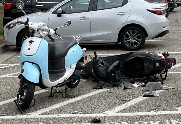A moped sits knocked over in West Circle in the North neighborhood on campus.