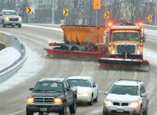 A snowplow at work. Credit: Michigan Department of Transportation.
