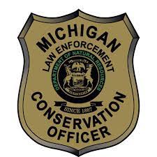 Michigan conservation officer badge.