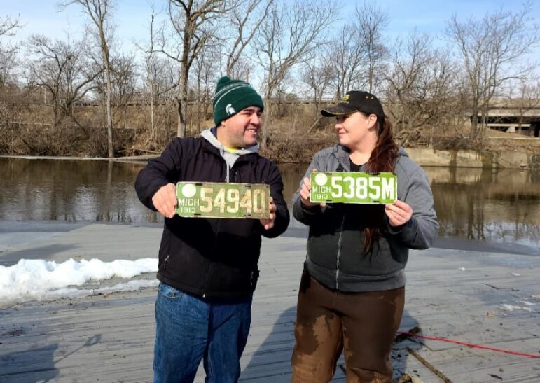These porcelain license plates were retrieved from the Grand River in Lansing.