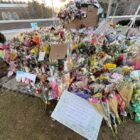 Flowers are placed on the campus of Michigan State University prior to a vigil on Feb. 24.