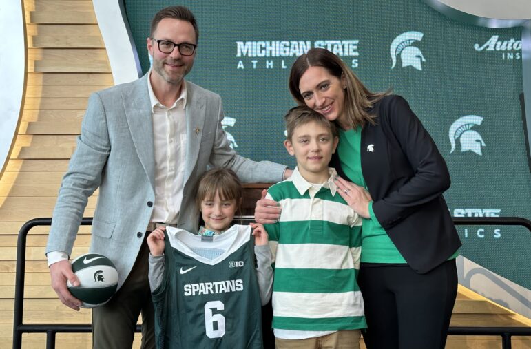 MSU women's basketball head coach Robyn Fralick with her husband Tim and children Will and Clara during her introductory press conference on April 4.