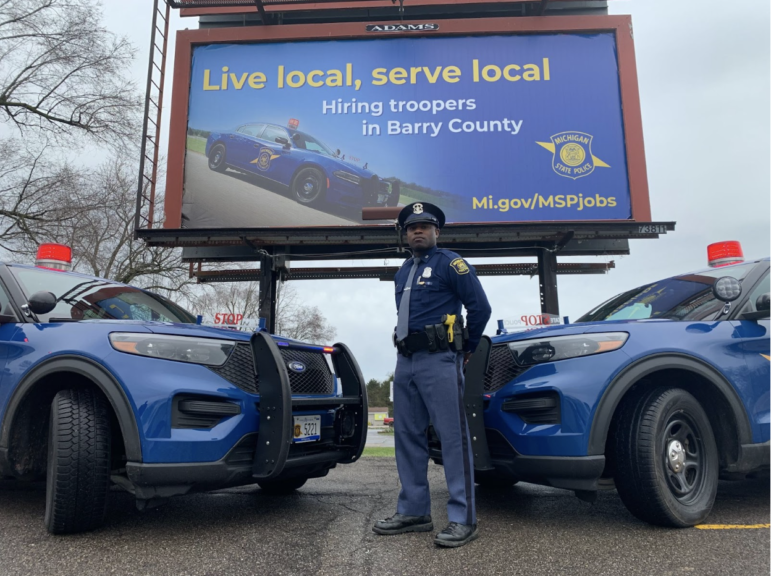 Michigan State Police promotes trooper openings through a billboard campaign, including one in Barry County, with Wayland Post Trooper Steffon Mayhue.
