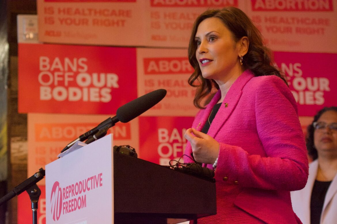 Gov. Gretchen Whitmer signs legislation repealing the state's 1931 abortion ban.