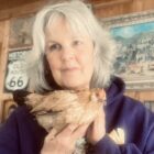 Marsi Darwin poses with Peanut, the world’s oldest chicken. Darwin estimates Peanut’s birthday is around May 1, making her 21 years old.