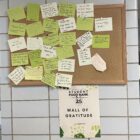 Wall of gratitude located in the MSU Student Food Bank. Sticky notes expressing peoples gratitude