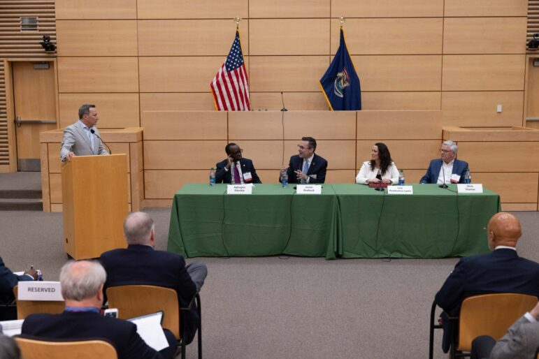 Panelists at an American Bar Association Task Force for American Democracy event discuss the potential impact of early voting in Michigan elections.