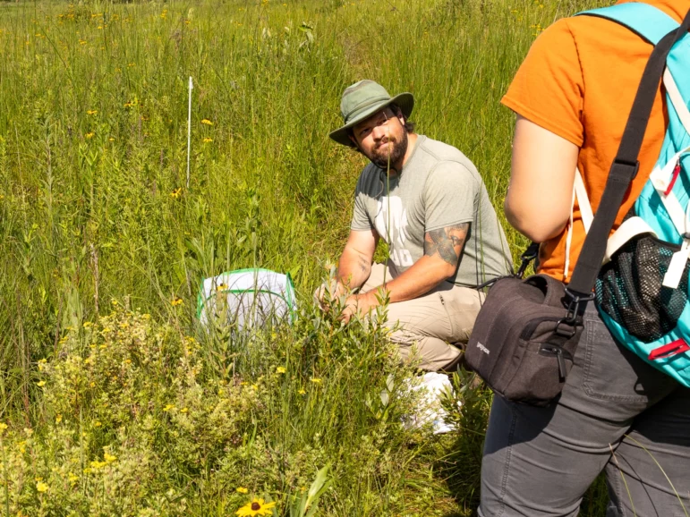 Cale Nordmeyer is getting ready to release one of the butterflies.